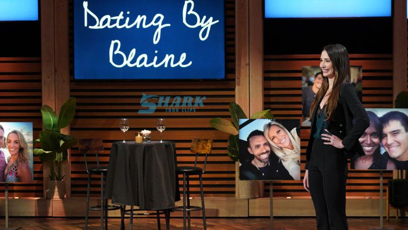 Founder of Dating By Blaine presenting on Shark Tank with a romantic setup, including a table for two and happy couple portraits, showcasing the dating service's success